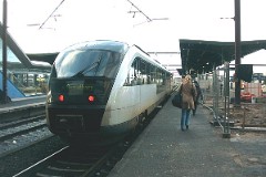 DSB Desiro MQ 4114 trainset photographed at the railway station in Odense 31. December 2003.The MQ class is built by Siemens in Germany. DSB has leased 12 units primarily for the line Odense - Svendborg. The type is used widely in Germany. The trainsets were put in service in Denmark in 2002. Two diesel engines of 315 kW per trainset. Max speed 120 km/h - 75 mph. Length 41 700 mm. Weight 68,2 metric tonnes. 114 seats 2nd class. Up to 3 trainsets can be put together.